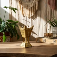 مبخرة خشبي ستيل بلونين ذهبي وفضي.
