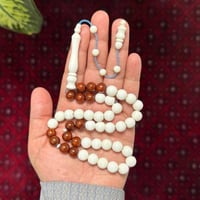 مسباح عظم جمل مع كوك