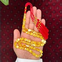 مسباح بكلايت محاكي للكهرمان