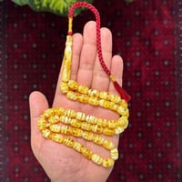 مسباح بكلايت محاكي للكهرمان