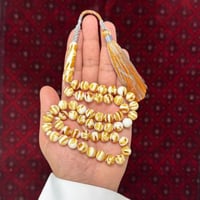 مسباح بكلايت محاكي للكهرمان