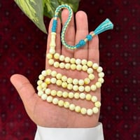 مسباح بكلايت محاكي للكهرمان