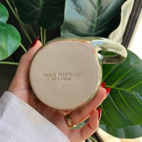 كوب القطة ليلي وصديقها ليو