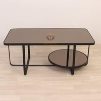 طاولة حديد لون اسود مطفي سطح زجاج مراية