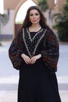 جلابيه بتدخيلات الخام البدوي وتطريز بالصدر