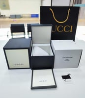 ساعة قوتشي نسائية فضي ذهبي