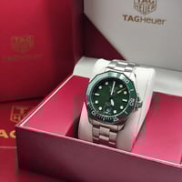 ساعة رجالية ماركة تاغ هيور فضي اخضر