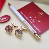 قلم وكبك كارتير ابيض ذهبي نحيف