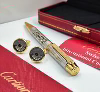 قلم وكبك ماركة كارتير فضي ذهبي