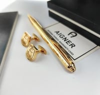 قلم وكبك اقنر لون ذهبي