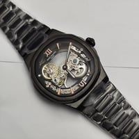 ساعة باتك فلب اسود مكشوف