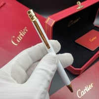 قلم وكبك كارتير ابيض ذهبي نحيف