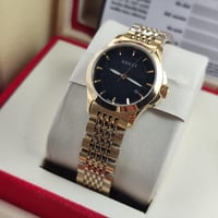 ساعة قوتشي نسائية ذهبي