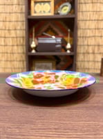 من القطع المتحفية الشحيحة؛ صحن غضار بقطر ٢٢ سم تقر...