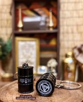 ميدالية تعليقة برميل نفط بشعار شركة أرامكو القديم،...