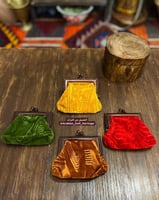 شنطة أو محفظة نقود إشتهرت أوائل الثمانينات الميلاد...