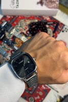 ساعه كاسيو مربع اطار فضي مينا اسود