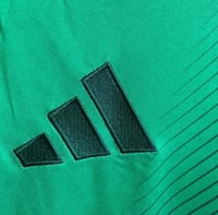 تي شيرت الأهلي الأساسي جامبو فئة الجماهير 2026/25