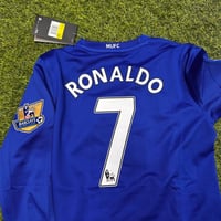 طقم مانشستر يونايتد الأزرق أكمام طويلة شبابي - أطف...