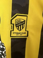 تي شيرت الاتحاد الأساسي جامبو فئة الجماهير 2026/25