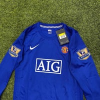 طقم مانشستر يونايتد الأزرق أكمام طويلة شبابي - أطف...