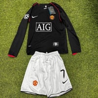 طقم مانشستر يونايتد الأسود أكمام طويلة شبابي - أطف...