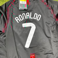 طقم مانشستر يونايتد الأسود أكمام طويلة شبابي - أطف...