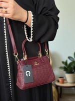 حقيبة اجنر عنابي