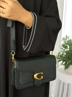 حقيبة كوتش تابي اسود لمعة /مطفي