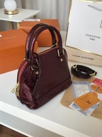 حقيبه لوي فيتون عنابي لمعة