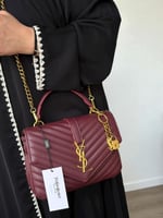 حقيبة سان لوران عنابي