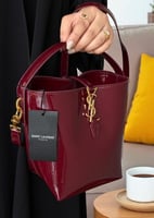 حقيبة سان لوران عنابي بلمعة ومطفي