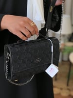 حقيبة كوتش كلاسيكي اسود