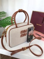 حقيبة ميو ميو وسط براون