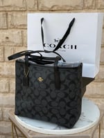 حقيبة كوتش توت باق وسط