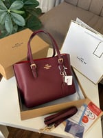 حقيبة كوتش مولي عنابي