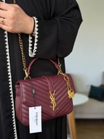 حقيبة سان لوران عنابي