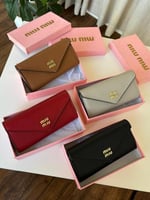 محفظة ميو ميو الوان