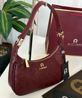 حقيبة اجنر عنابي