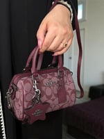 حقيبة كوتش عنابي