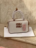 حقيبة ميو ميو وسط براون