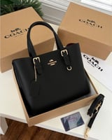 حقيبة كوتش مولي اسود