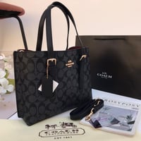 حقيبة كوتش مولي اسود