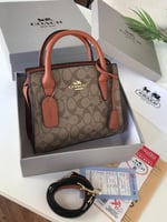 حقيبة كوتش بني