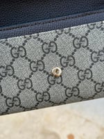 محفظة جوتشي كوفي