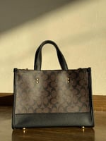 حقيبة كوتش توت باق حجم وسط