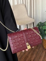 حقيبة سي اتش عنابي كوفي