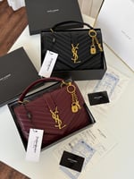 حقيبة سان لوران عنابي