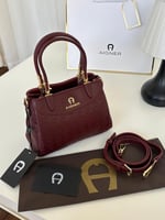 حقيبة اجنر عنابي