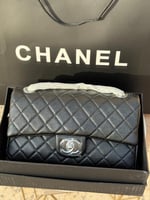 حقيبة شانيل كلاسيكي اسود شعار فضي